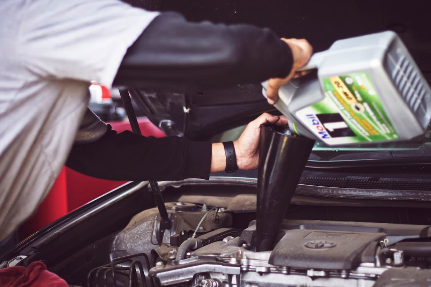 Independent auto repair shop with a vehicle on a lift