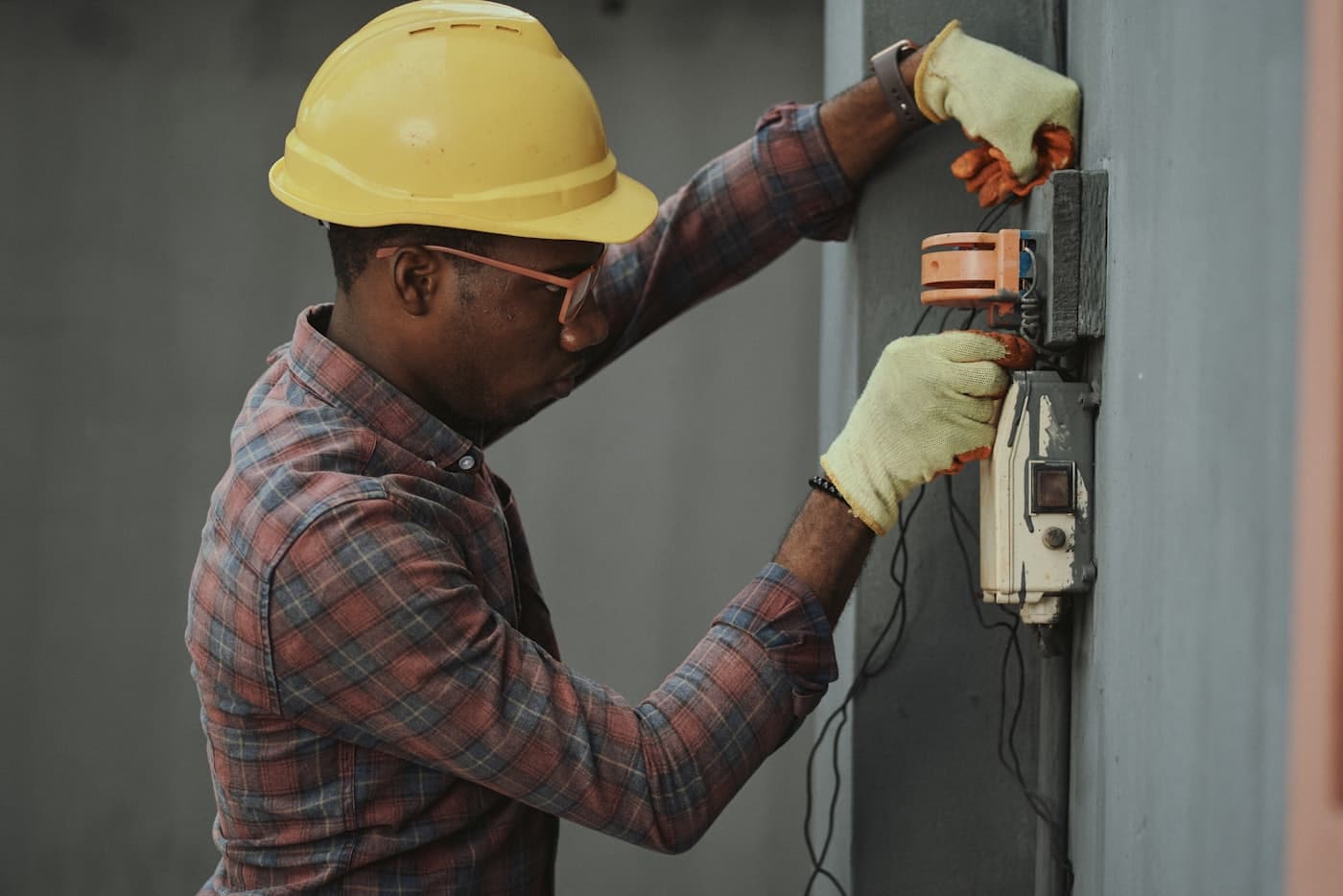 Technician working on residential mechanical equipment
