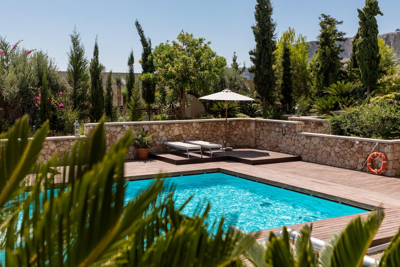 Residential swimming pool in a backyard setting