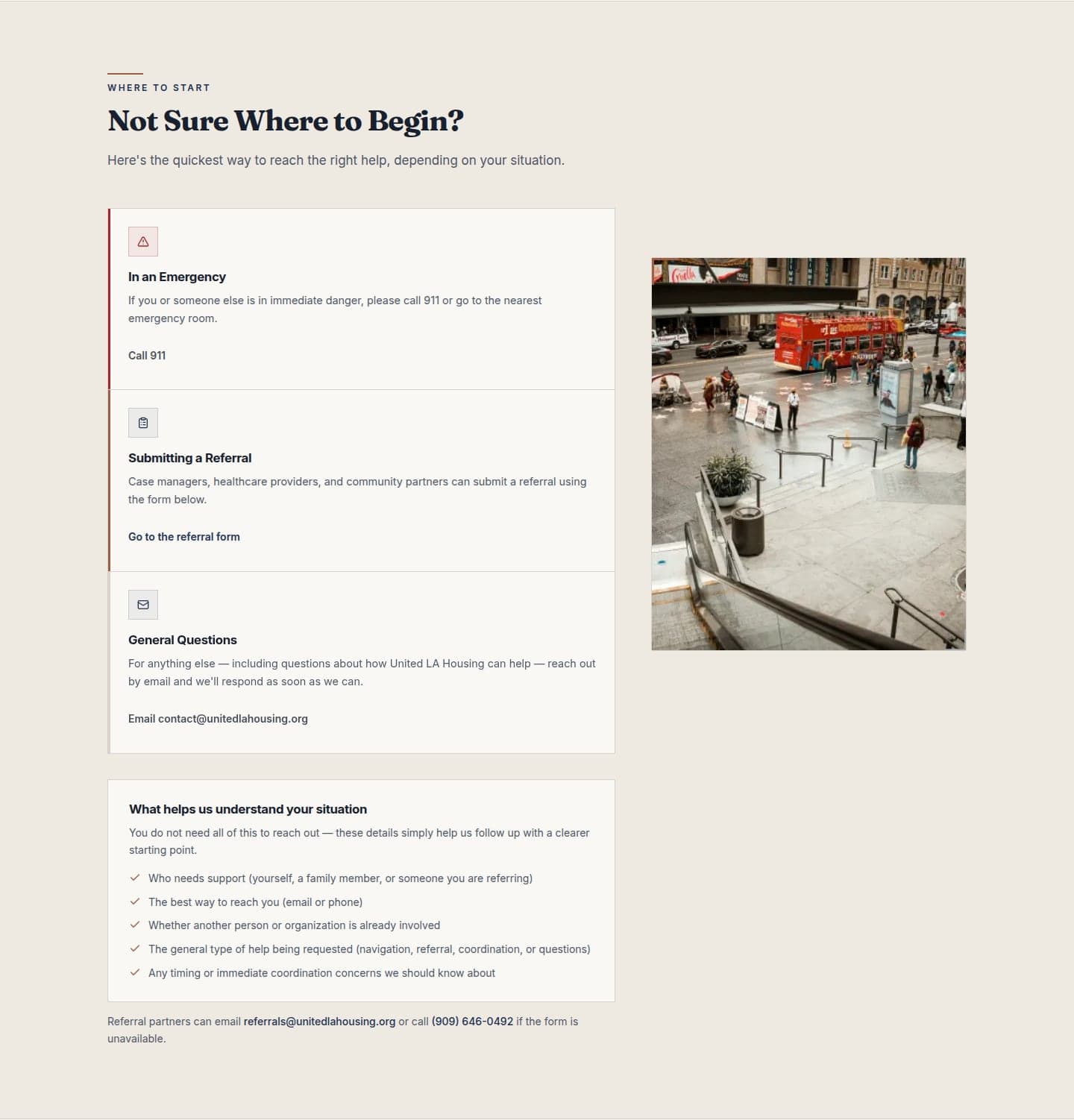 United LA Housing crisis-aware triage section — emergency, referral, and general-question paths